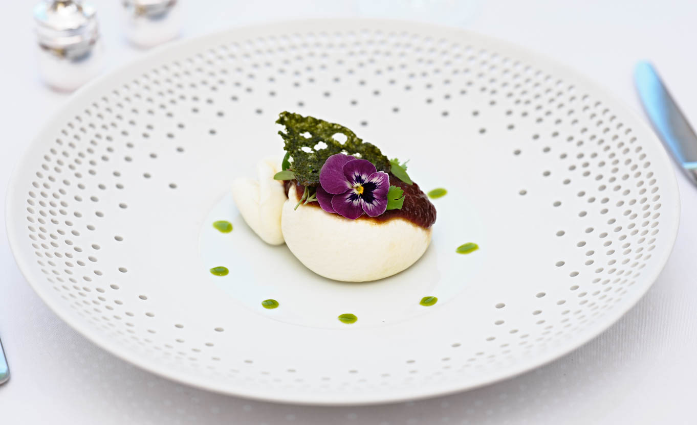 Artfully presented fine dining dish at Les Ambassadeurs Club in Mayfair