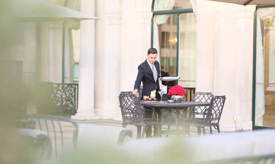 Elegant outdoor seating courtyard at Les Ambassadeurs Club in Mayfair
